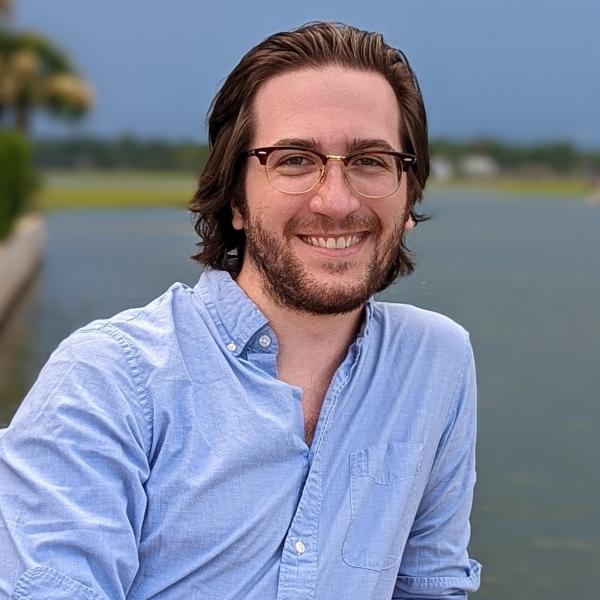 Headshot of Patrick Fiorilli against natural background.